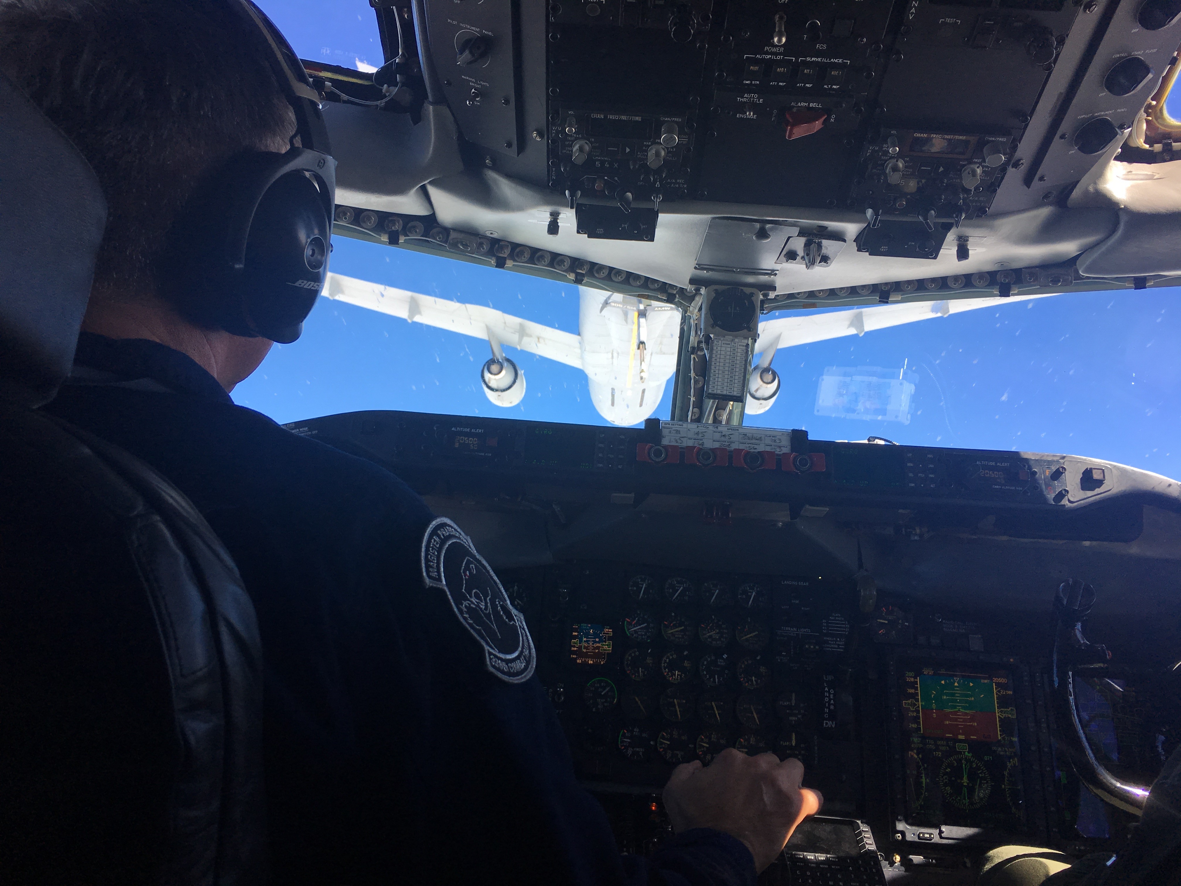 Aircraft cockpit view during aerial refueling