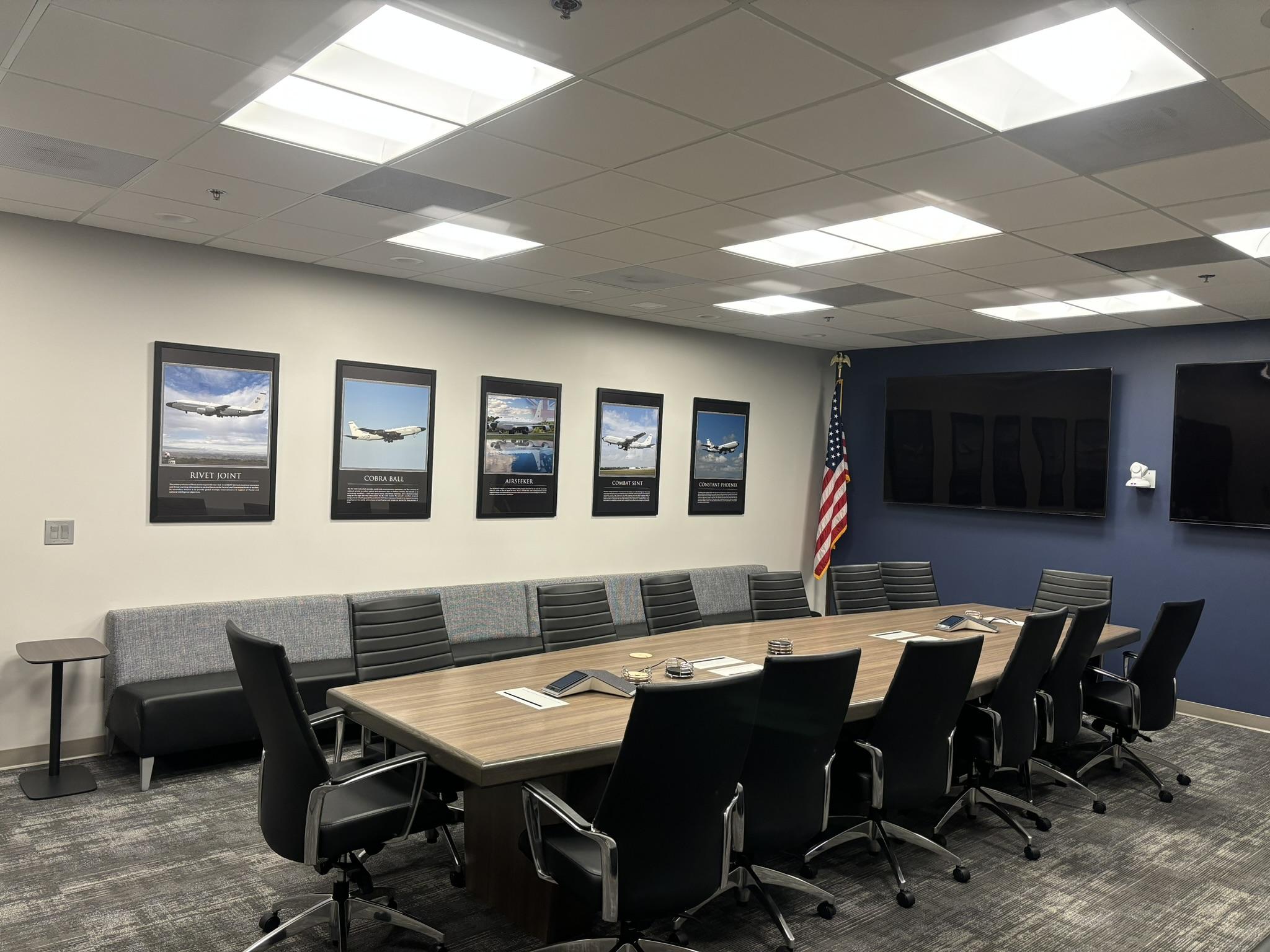 Calvert conference room with RC-135 aircraft prints
